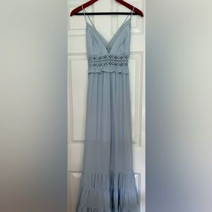 Beautiful light blue maxi dress with lace and ruffle detail! Never worn with tag